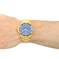 Movado Series 800 Blue Dial Gold Steel Strap Watch For Men - 2600144