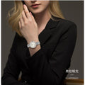 Tissot T Lady Flamingo Diamonds White Dial Silver Steel Strap Watch For Women - T094.210.11.116.01