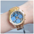 Guess Mini Sunrise Quartz Blue Dial Gold Steel Strap Watch For Women - W0448L6