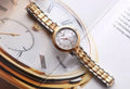 Tissot Flamingo Mother of Pearl White Dial Two Tone Steel Strap Watch For Women - T094.210.22.111.01