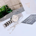 Guess Cubed Analog Silver Dial Silver Steel Strap Watch For Women - GW0606L1