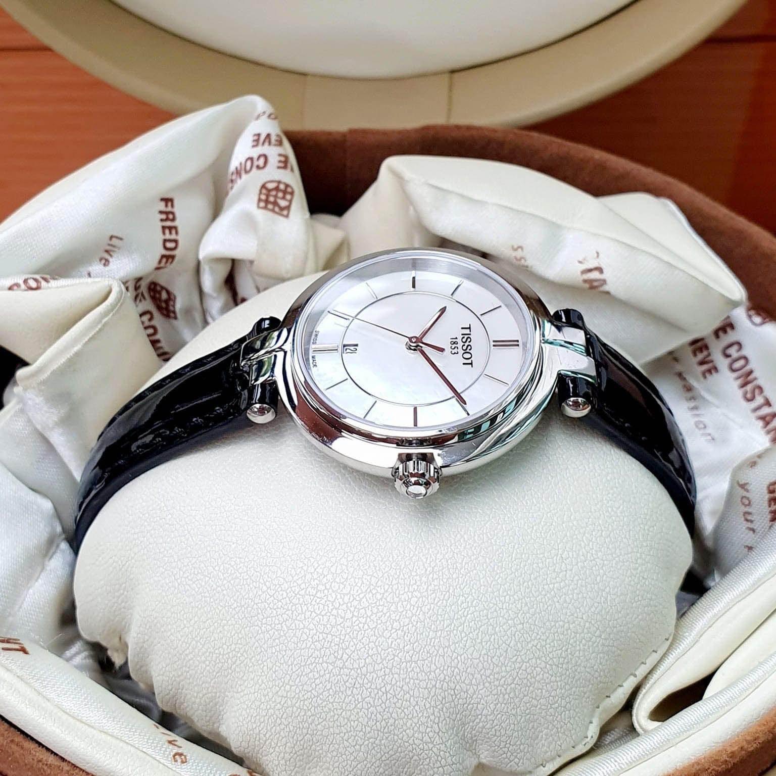Tissot T Lady Flamingo Mother of Pearl White Dial Black Leather Strap Watch for Women - T094.210.16.111.00
