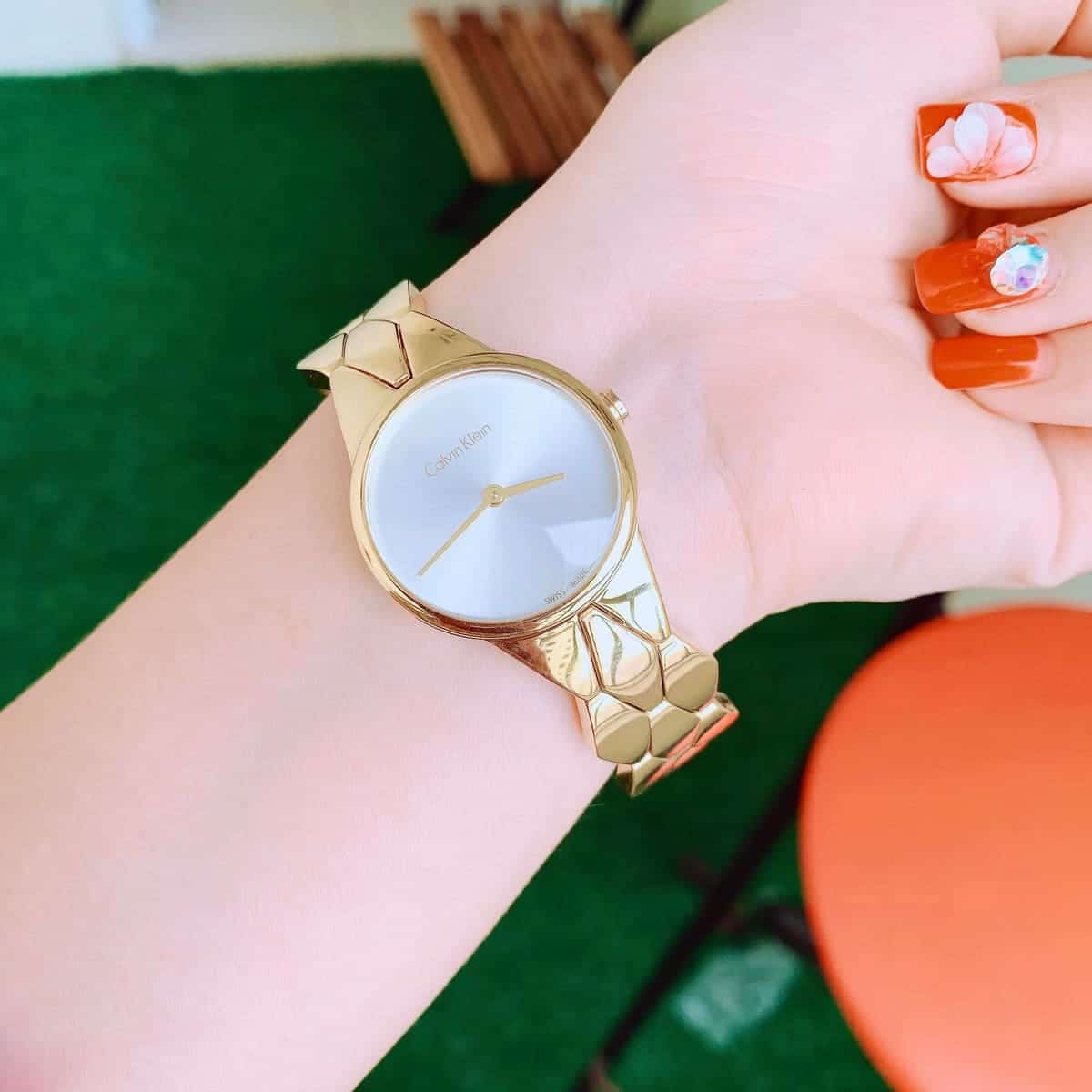 Calvin Klein Snake Silver Dial Yellow Gold Steel Strap Watch For Women - K6E23546