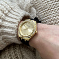 Guess Cosmo Diamonds Gold Dial Black Rubber Strap Watch for Women - GW0034L1